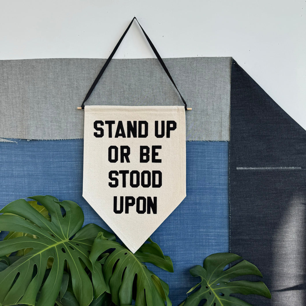 stand up or be stood upon